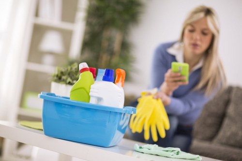 Deep cleaning a living room sofa in Creekmouth to remove dirt and stains